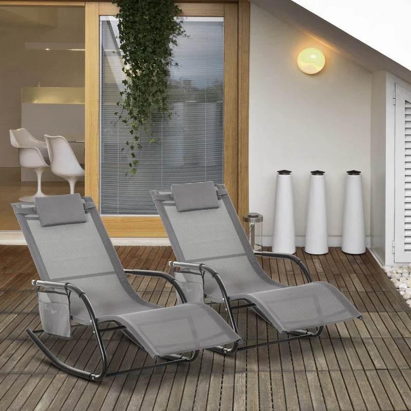 Grey outdoor rocking sun lounger set of two with headrest pillows and armrests