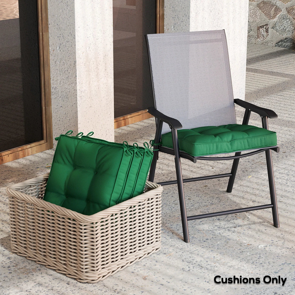 Green outdoor seat cushions with tufted tops and elastic tie straps on patio chairs