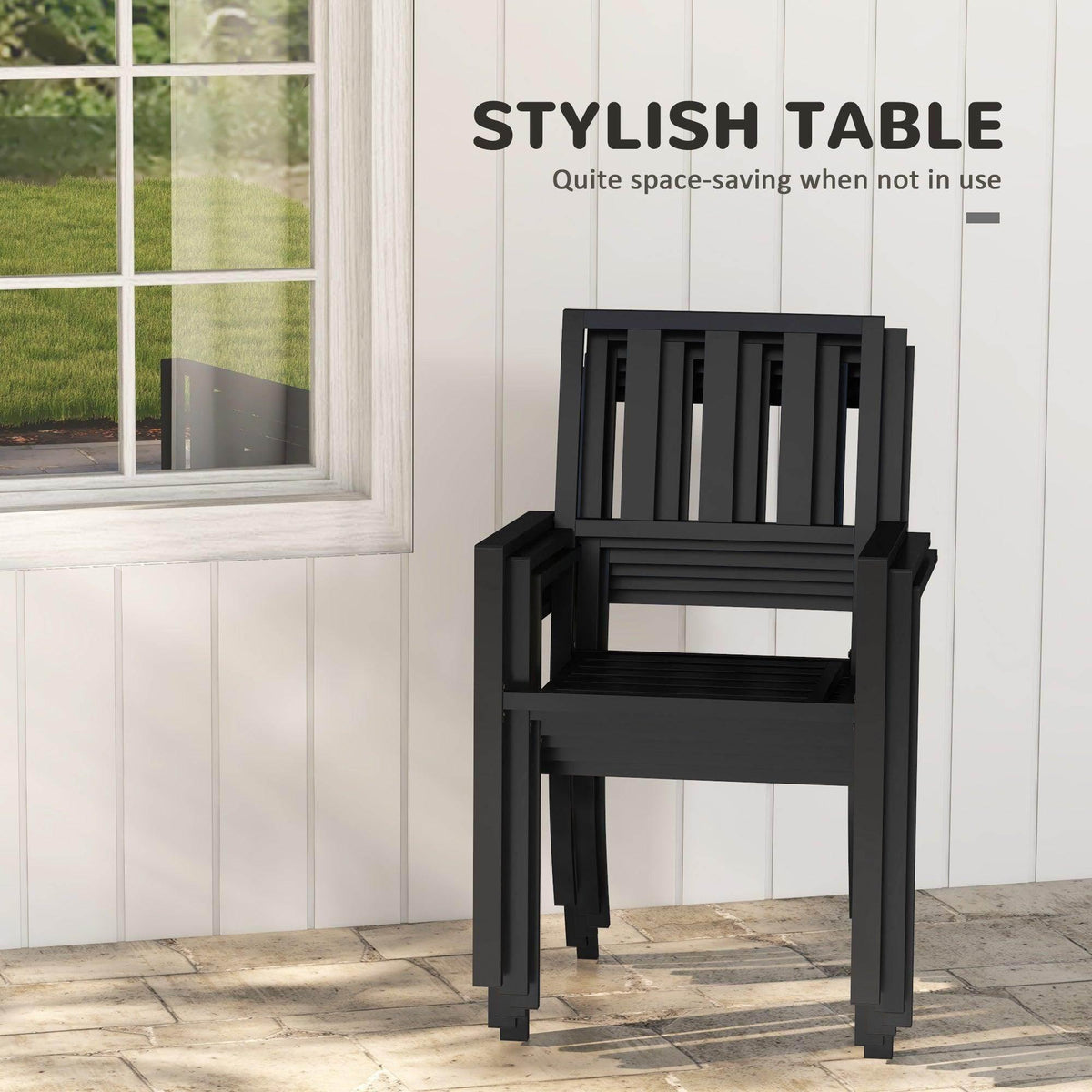 Black outdoor armchair with slatted back and seat, space-saving patio seating.