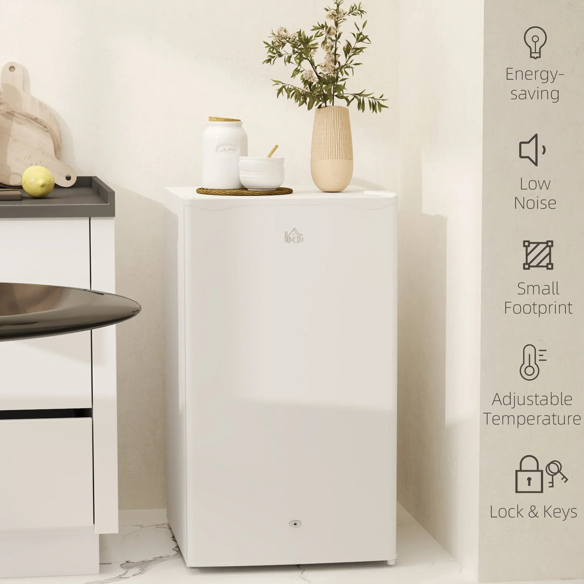 White compact under-counter fridge with single door and small footprint