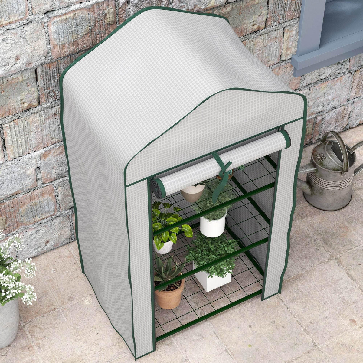 Three-tier portable mini greenhouse with white PE cover, green-trim frame, and 3 wire shelves