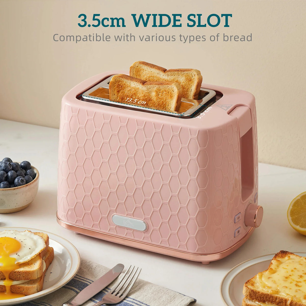 Light pink honeycomb 2-slice toaster with wide slot holding bread slices