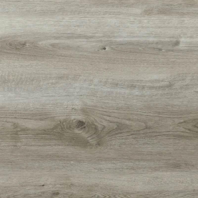 Light grey woodgrain plastic tabletop surface close-up