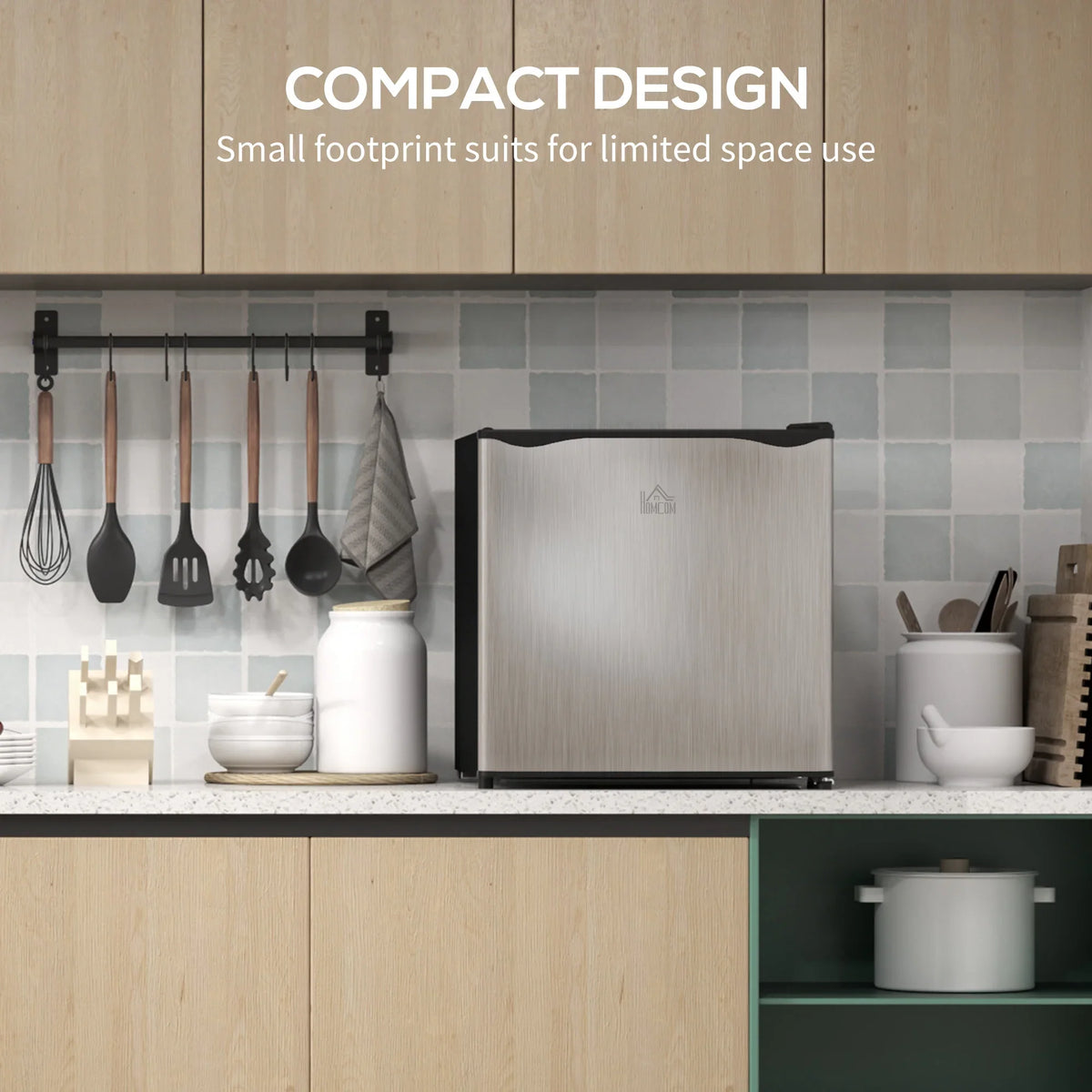 Compact mini freezer with brushed silver finish and black trim, designed for limited spaces