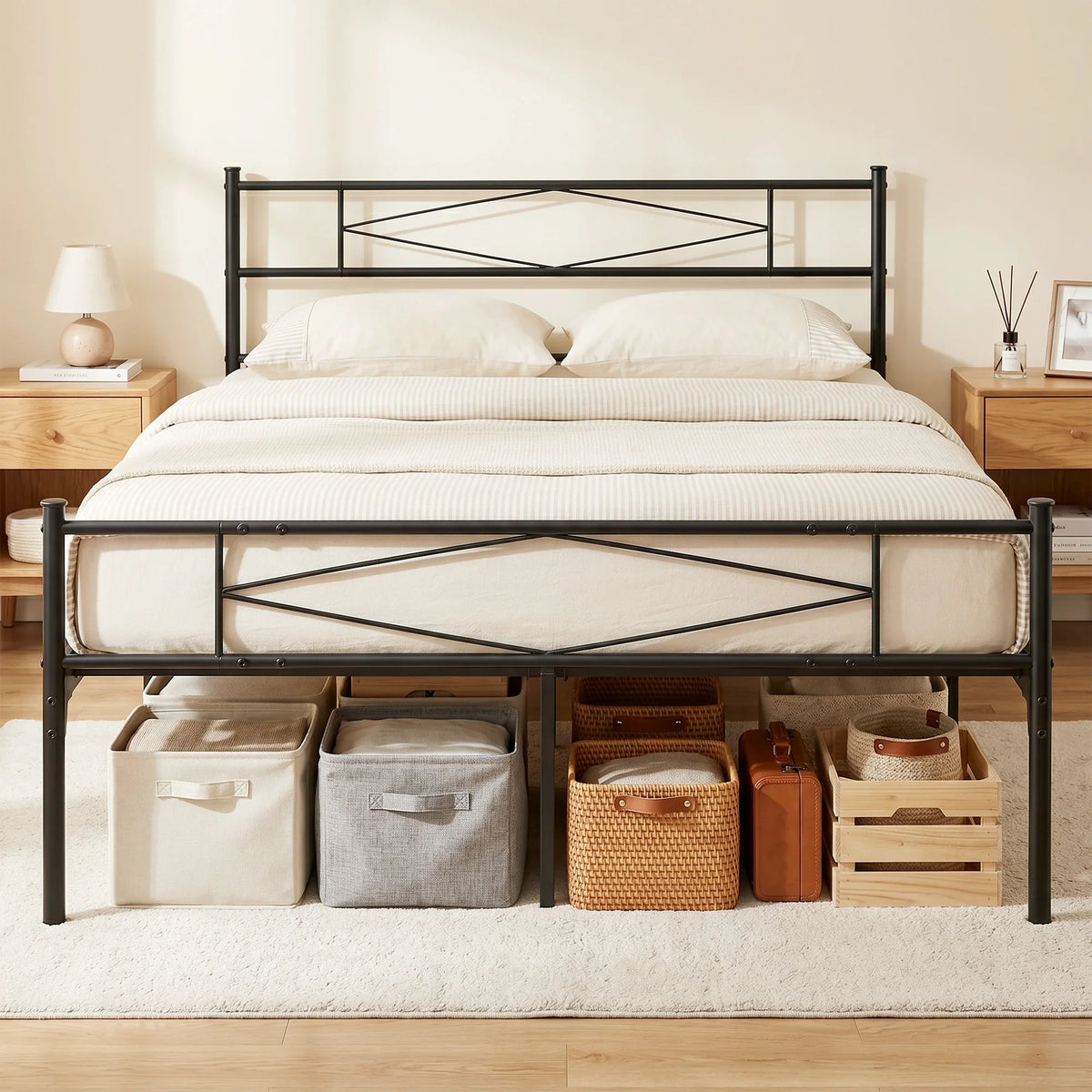Black metal double bed frame with headboard, footboard, and underbed storage drawers