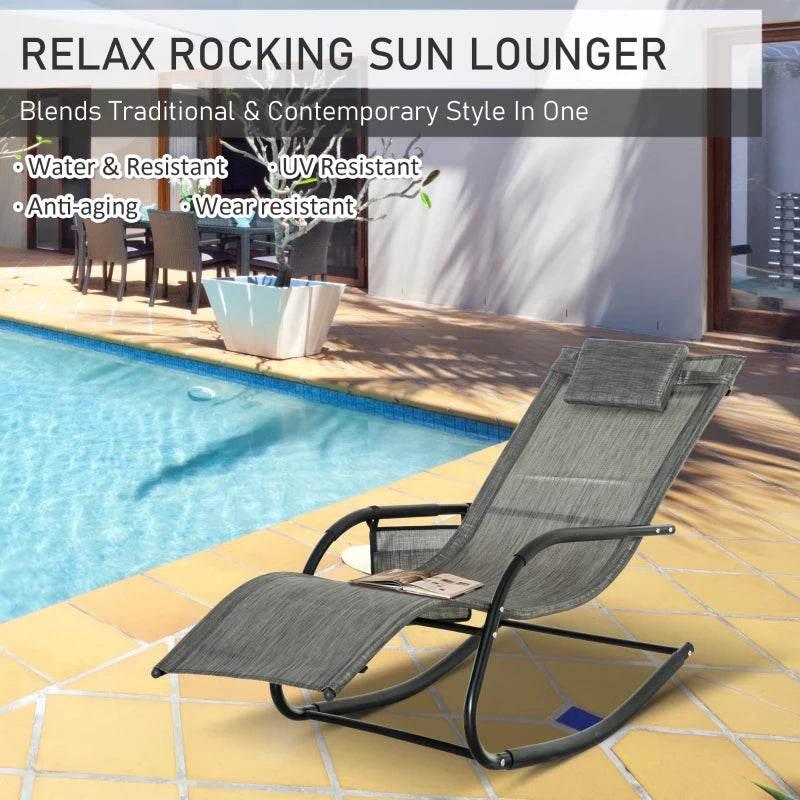 Dark grey rocking sun lounger with padded headrest and extended footrest