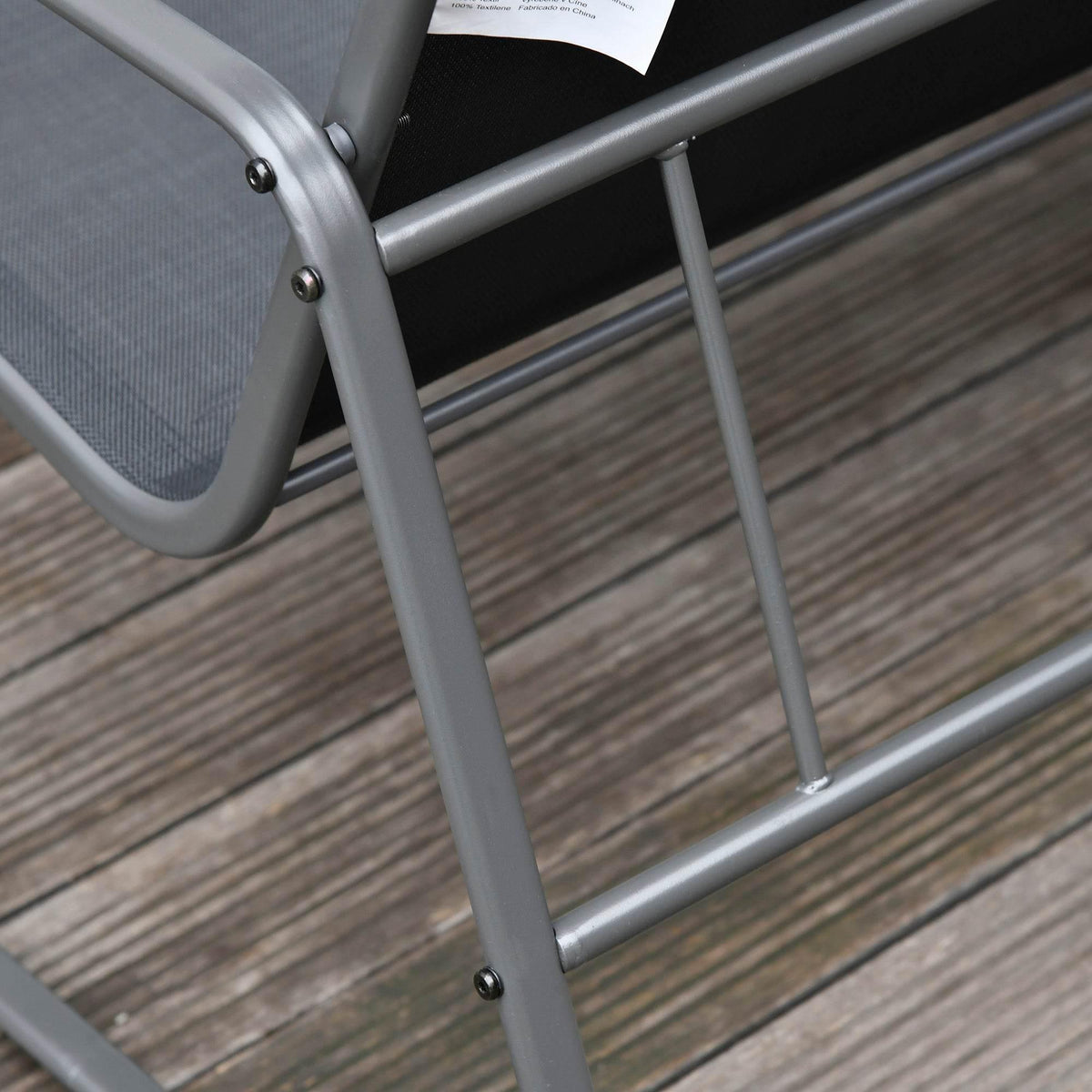 Close-up of chair frame joints and adjustable legs for outdoor seating