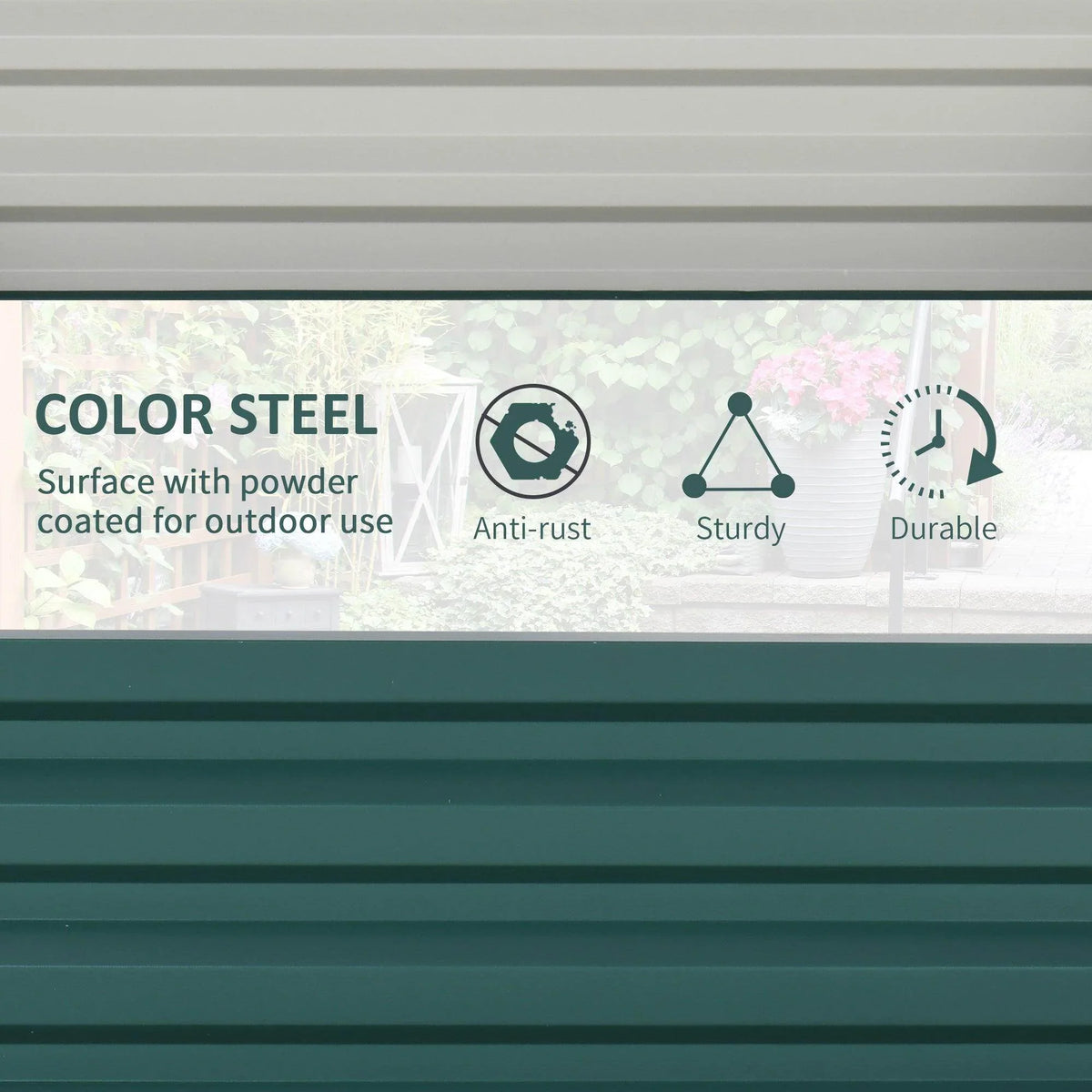 Close-up of green powder-coated metal side panels on a raised garden bed