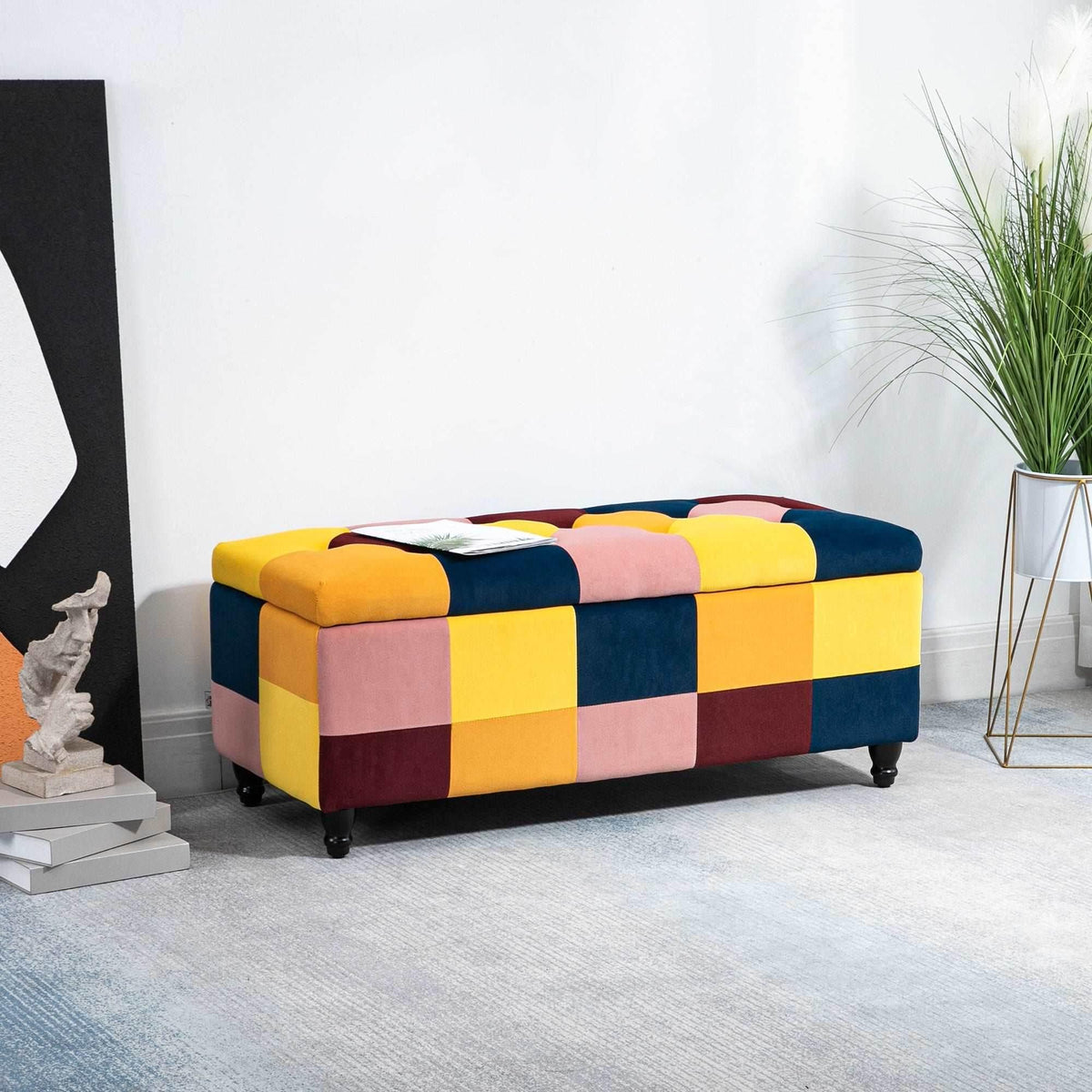 Patchwork velvet storage ottoman with hinged lid, multicolor block pattern on legs