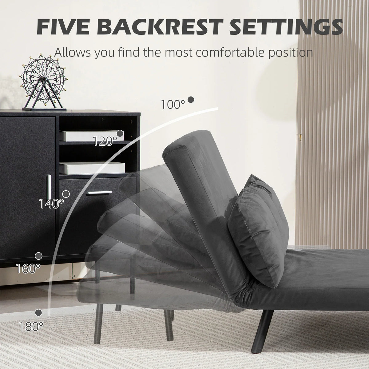 Dark grey sofa bed with reclined backrest and two tufted cushions, side view