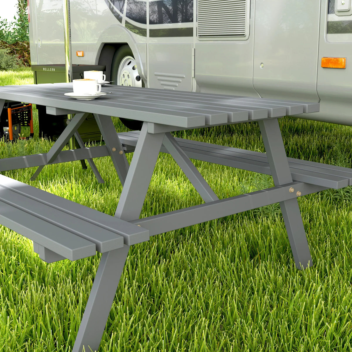 Grey outdoor picnic table bench with slatted benches and sturdy end supports, close-up
