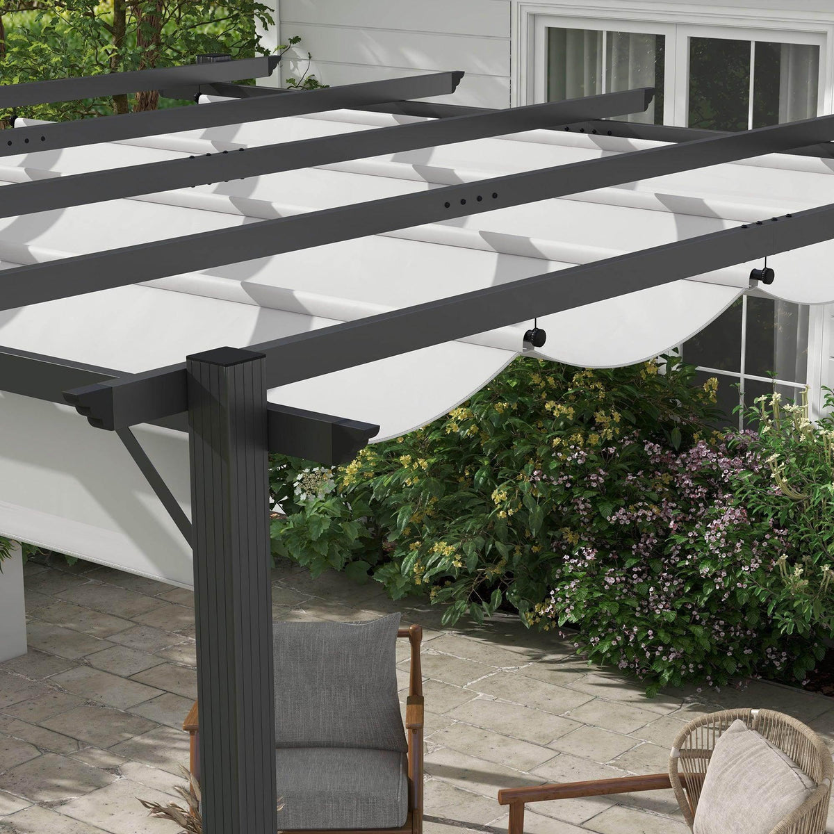 Close view of light grey retractable canopy panels on dark aluminum pergola frame posts