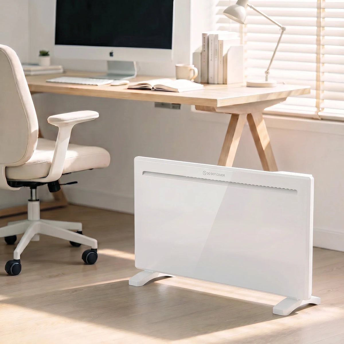 White freestanding panel heater with angled feet and front vent bar.
