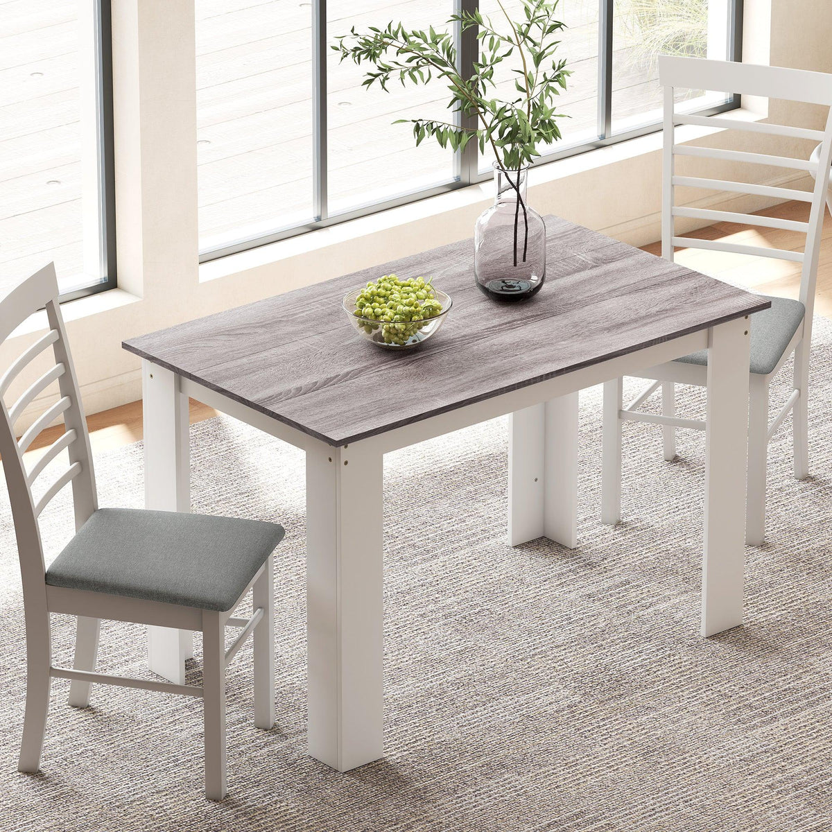 Grey wood-effect dining table with rectangular top and white legs