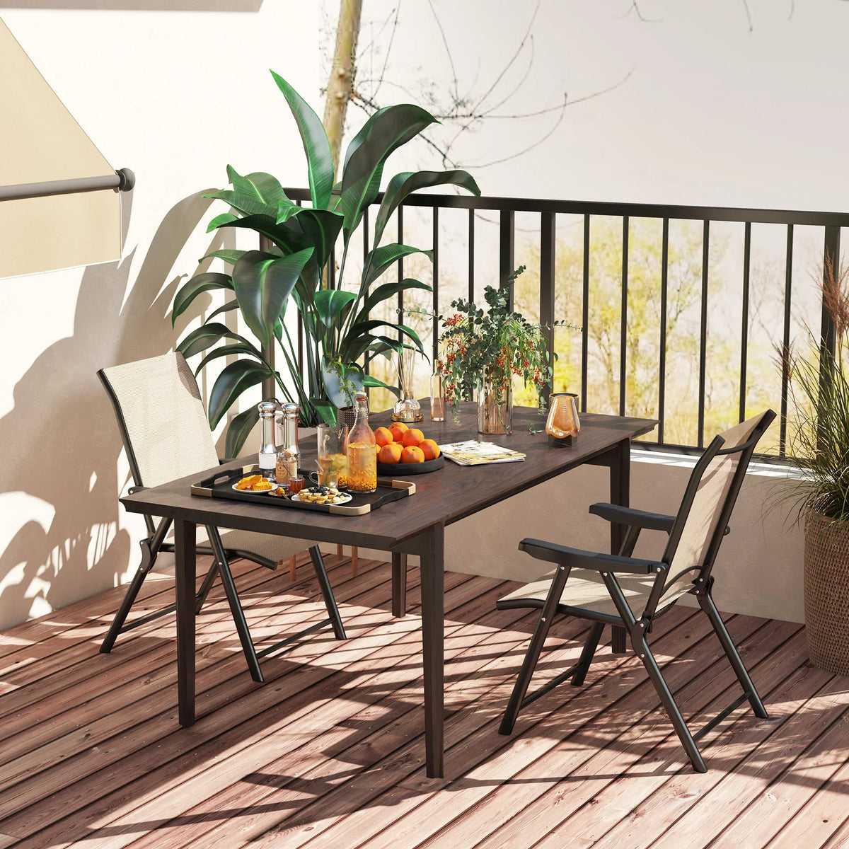 Two folding patio chairs with tall tan breathable mesh backs and black metal frames