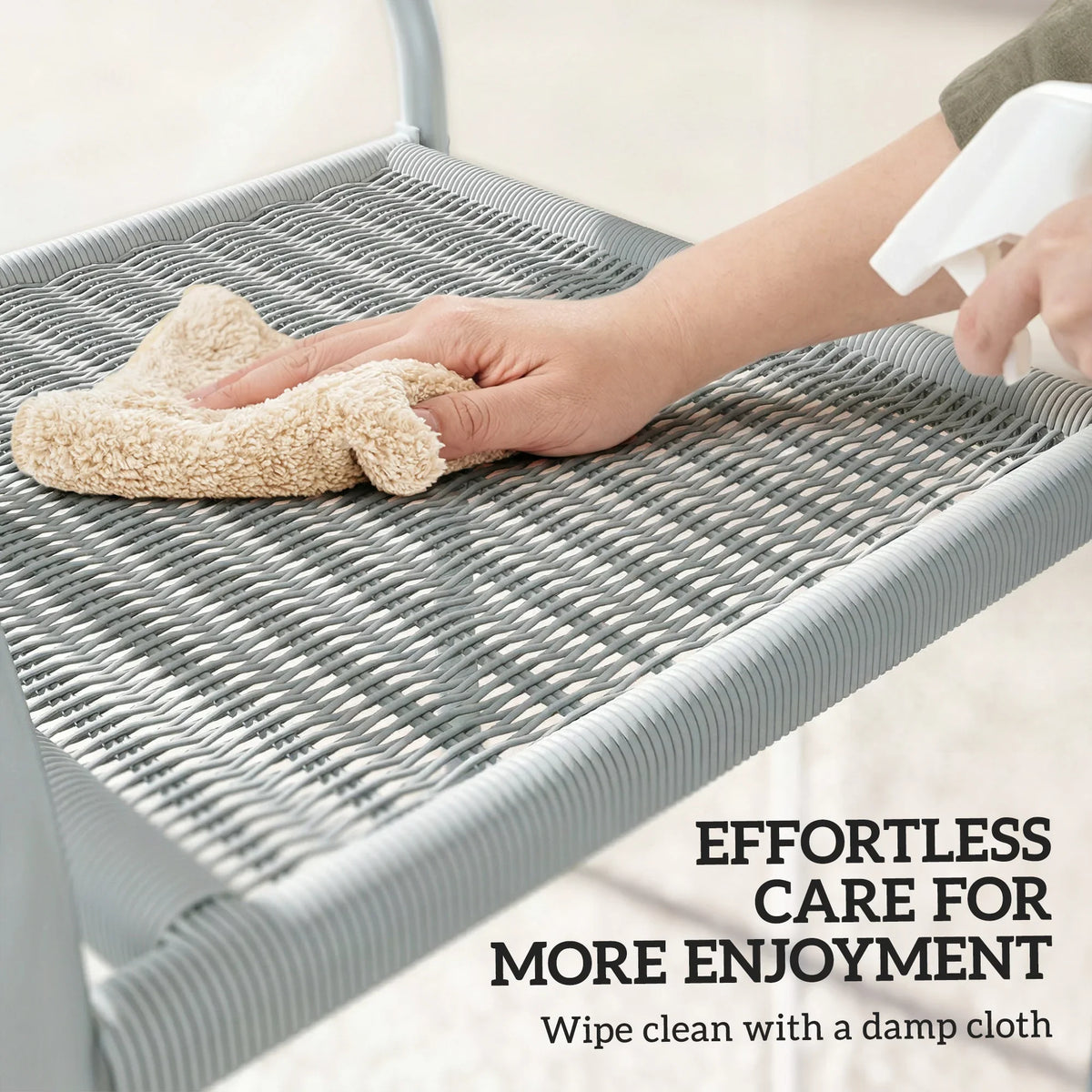 Light grey rattan-effect outdoor chair seat wiped clean with a damp cloth.
