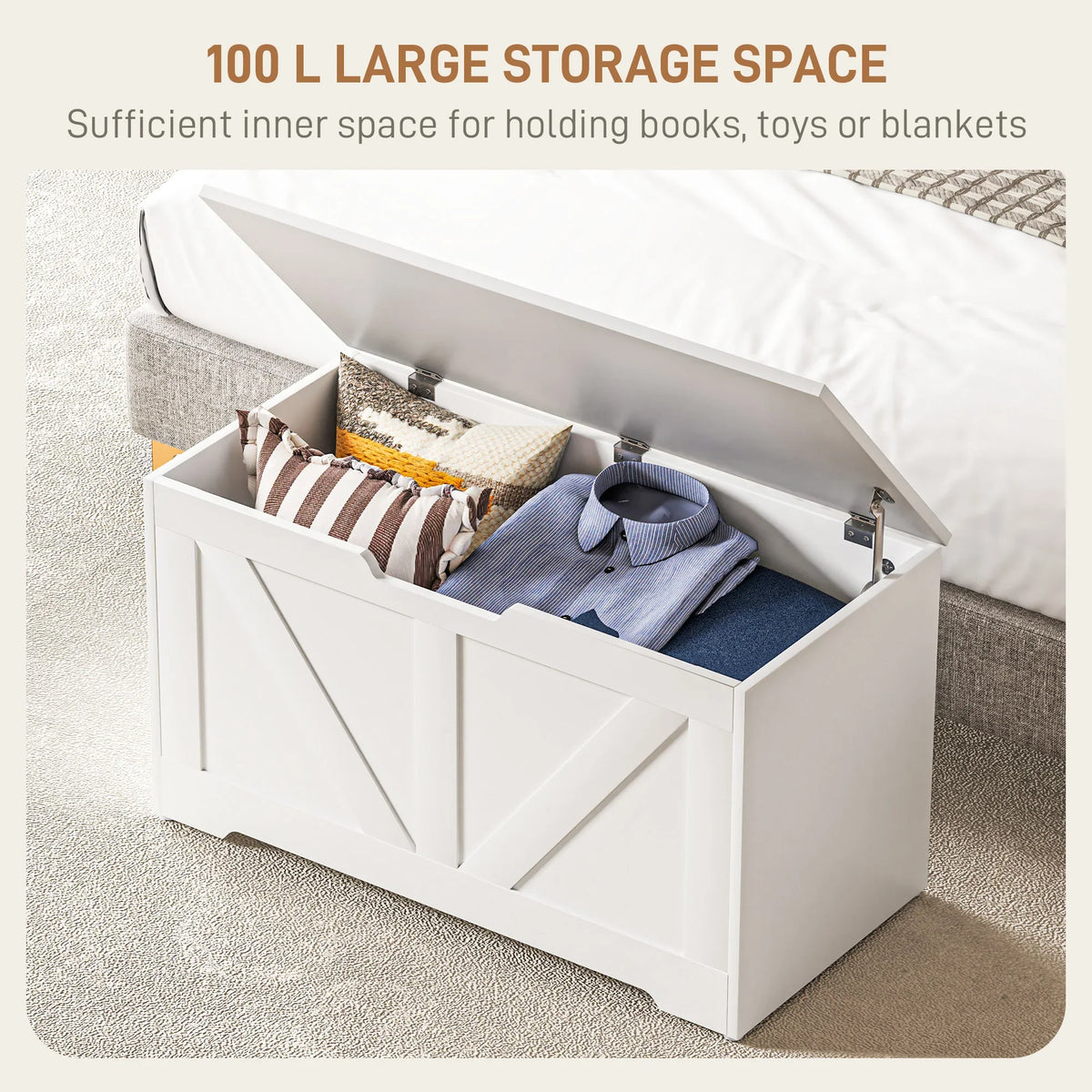 White storage ottoman with open lid showing interior space for linens and toys.