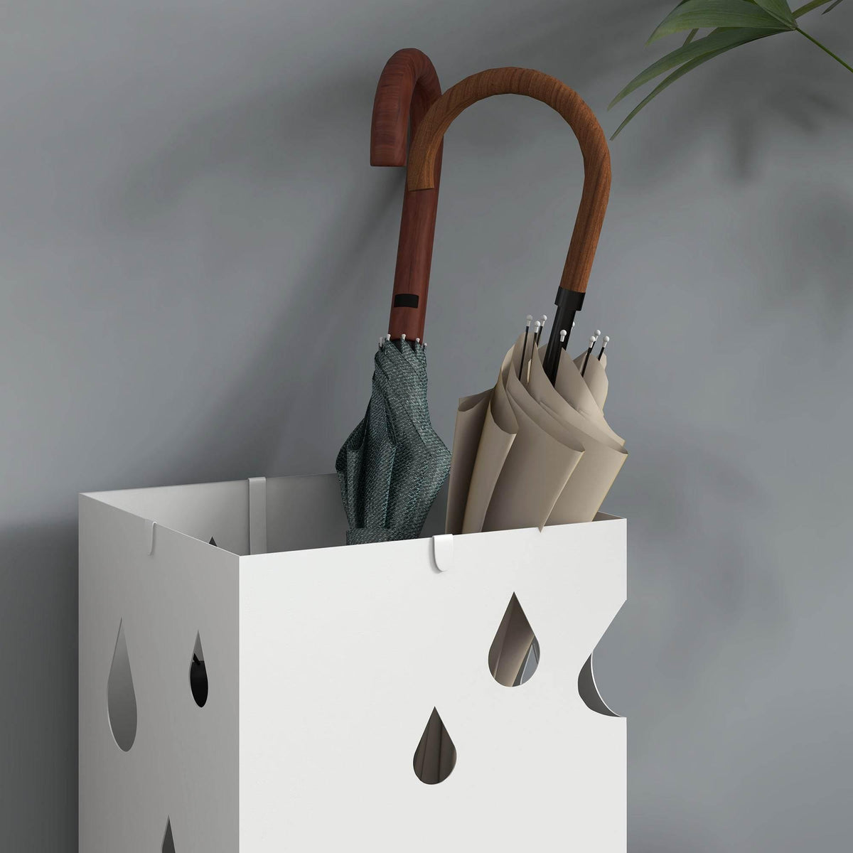 White steel umbrella holder stand with raindrop cutouts, holding two umbrellas