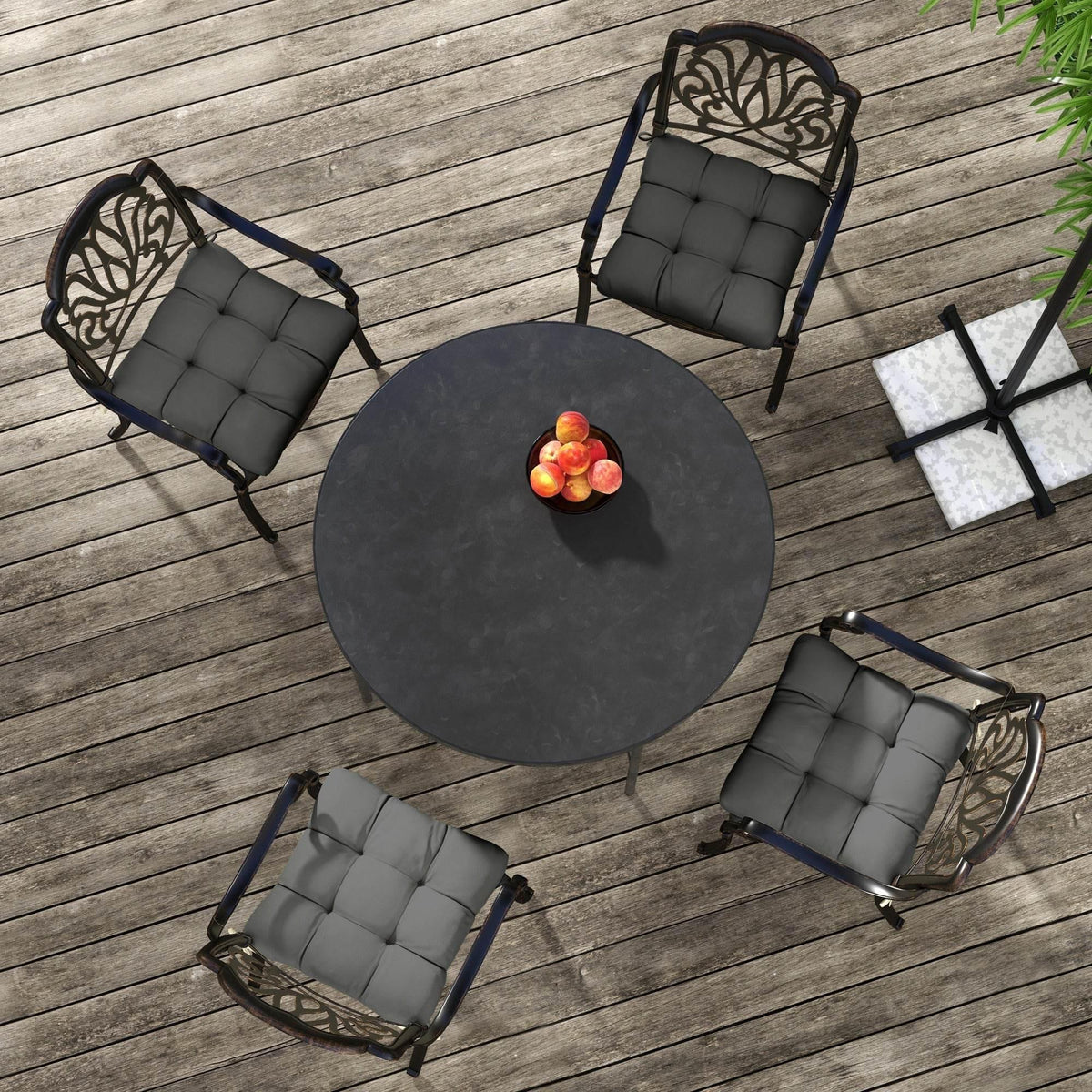 Charcoal grey 4-piece seat cushion set with tufted pads and tied corners