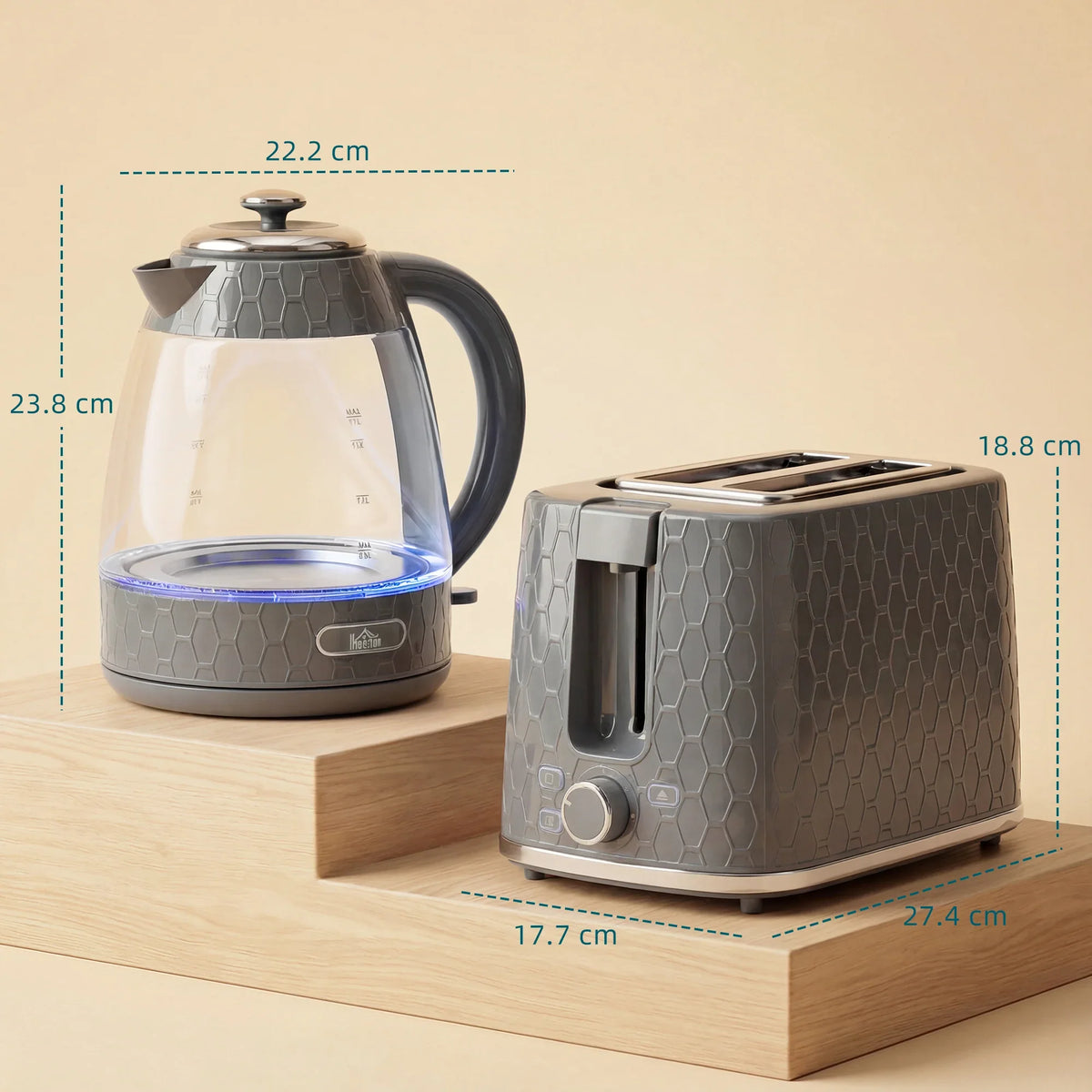 Grey countertop electric kettle and 2-slice toaster set shown from the side with base.