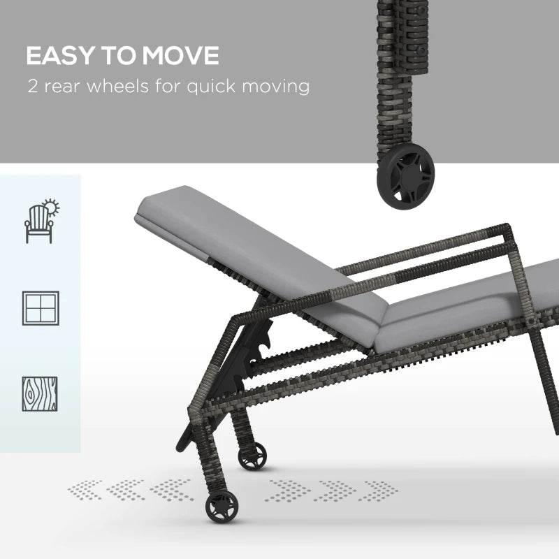 Rattan sun lounger with gray cushions and two rear wheels for easy moving