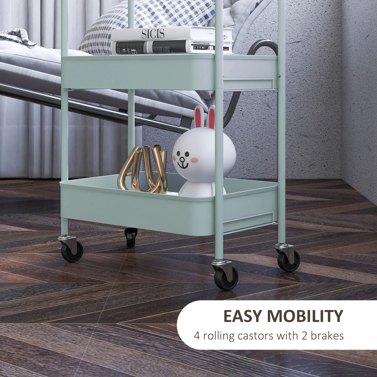 Light blue storage trolley with three tiers, side rails, and four caster wheels