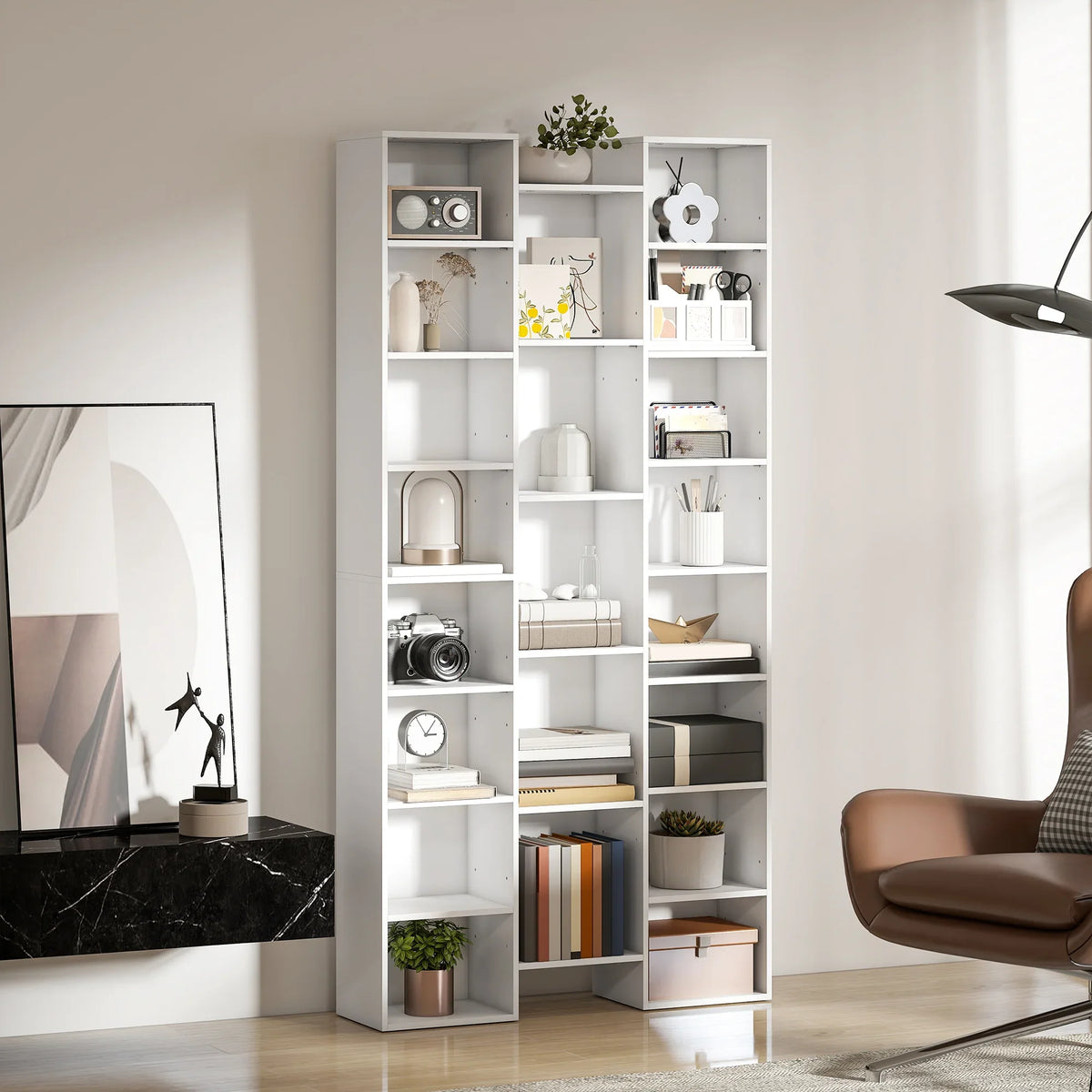 White narrow tall bookshelf standing upright with open cubby shelves