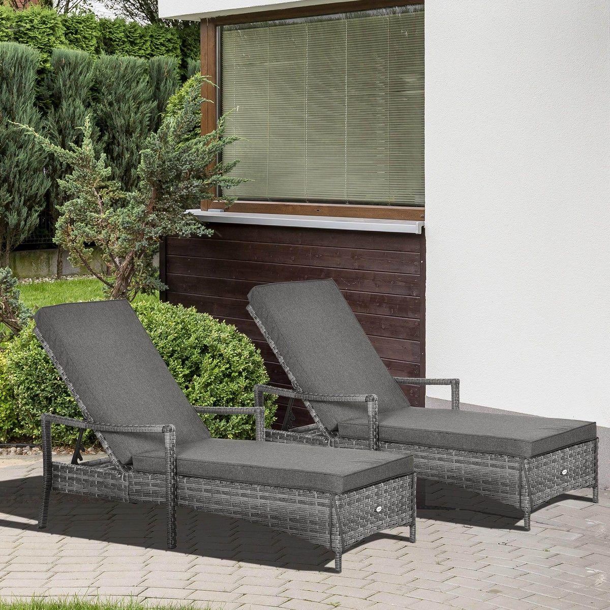 2-piece rattan sun lounger set with gray cushions and adjustable reclining backrests