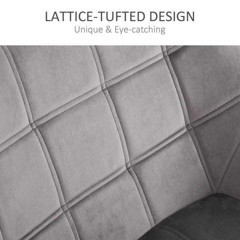Grey armchair with tufted lattice upholstery on seat and back
