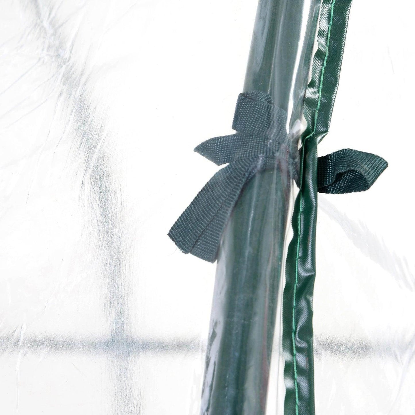 Close-up of green ties securing clear plastic cover to metal frame of 2.5x2m walk-in polytunnel greenhouse