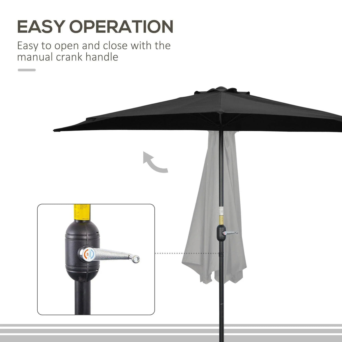 Black half umbrella with open canopy and manual crank handle on pole