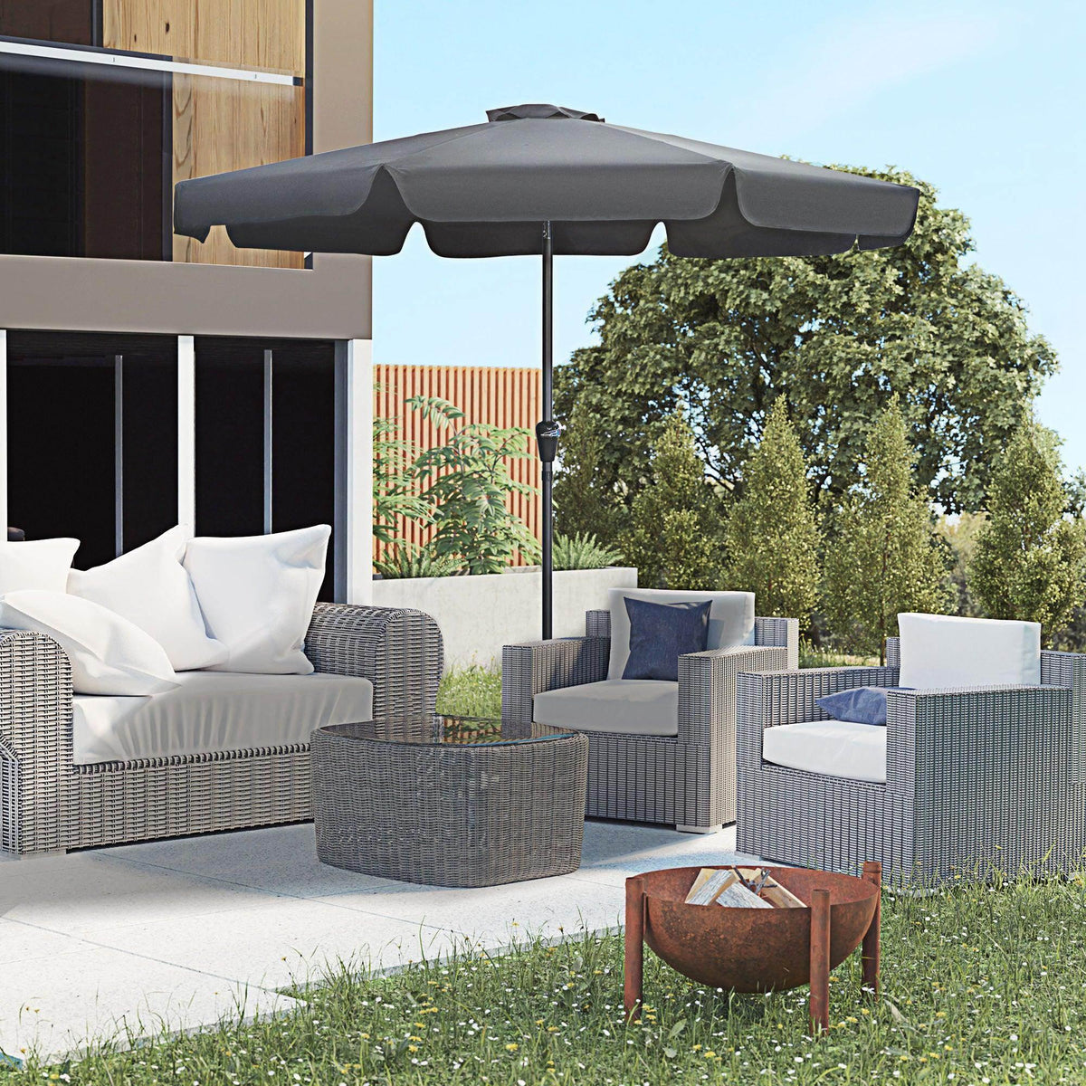 Outdoor patio umbrella with black canopy and valance fringe, open for shade