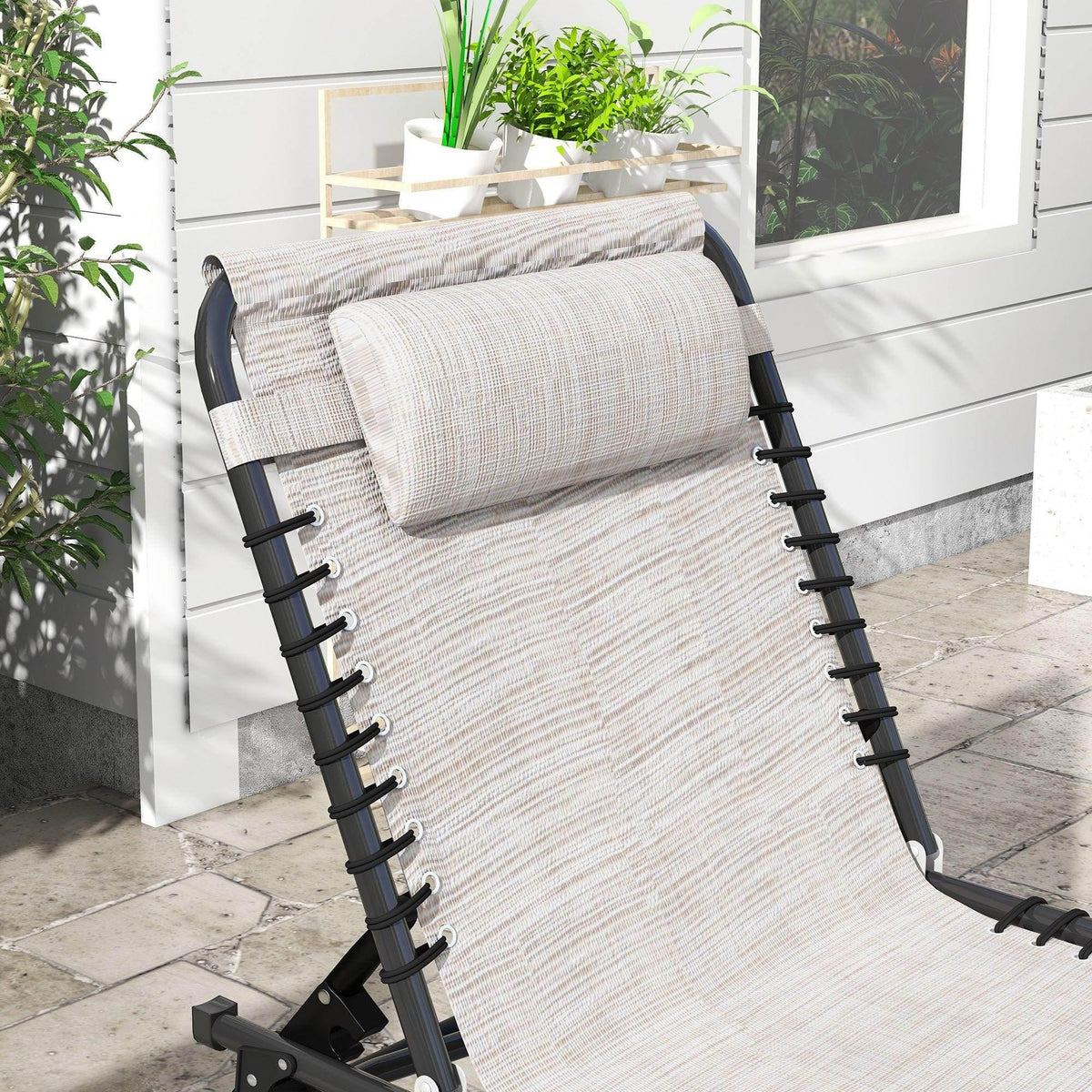Cream mesh chaise lounge with black side supports and adjustable backrest