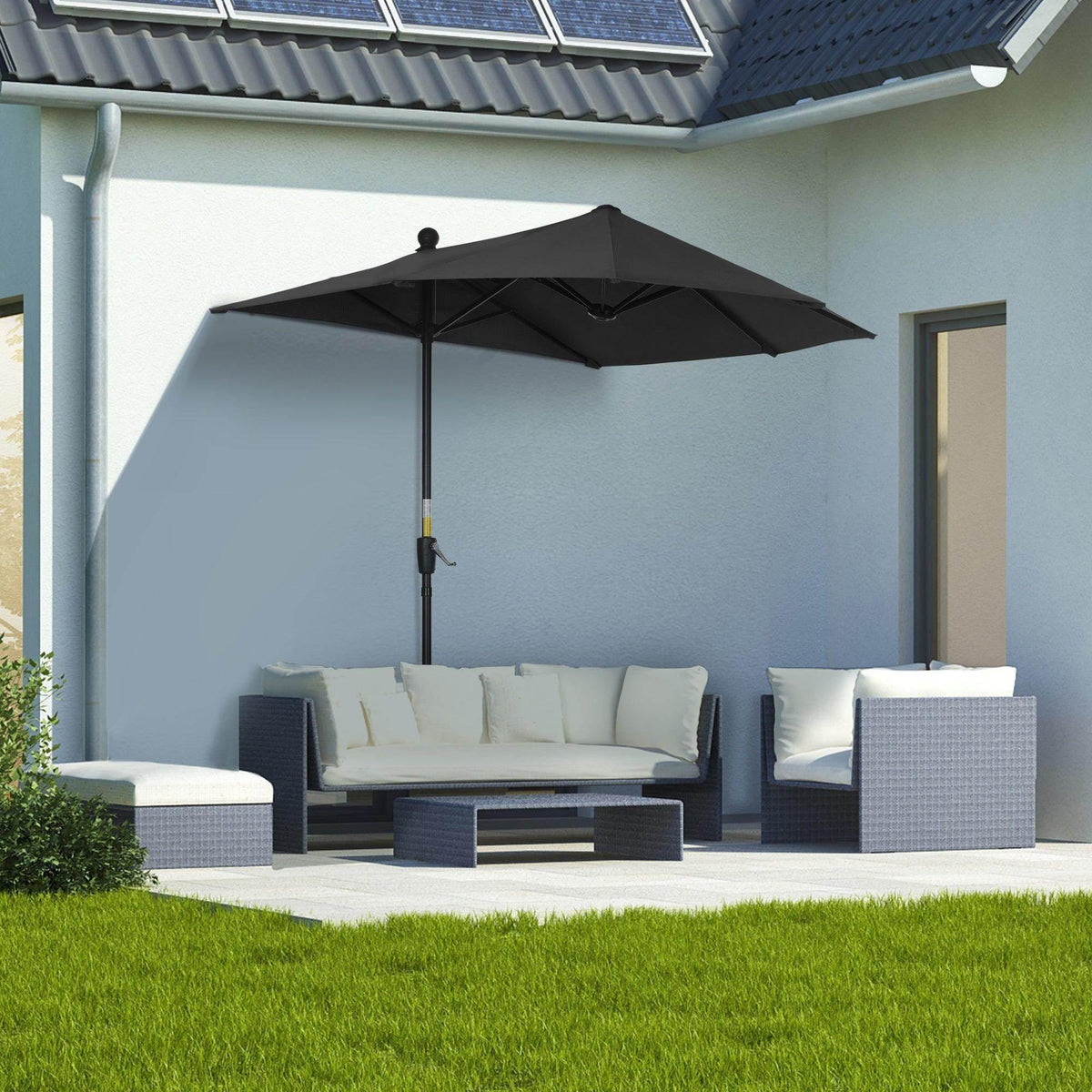Black half parasol with open canopy and straight support pole on patio