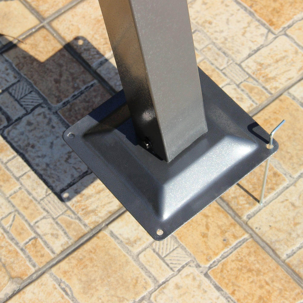 Steel leg base plate with mounting holes for securing a pergola gazebo