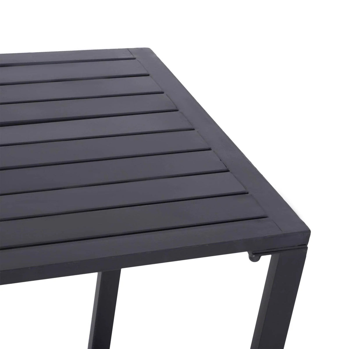 Close-up of dark slatted tabletop surface on outdoor metal beer table