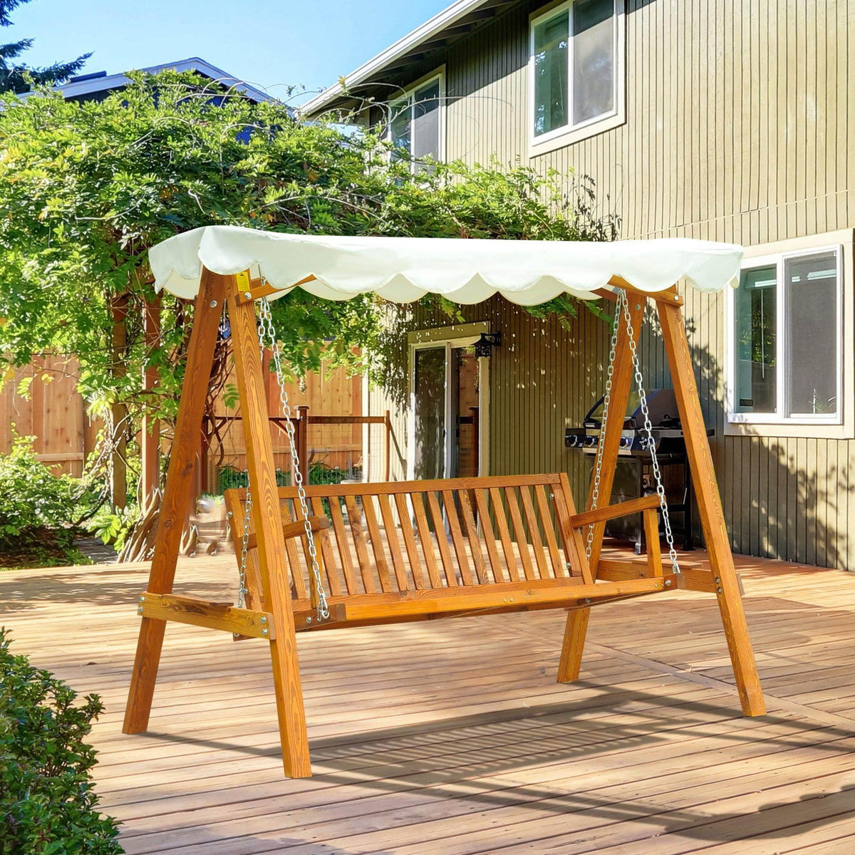 Wooden outdoor porch swing with white canopy on deck, perfect for garden relaxation and backyard leisure.