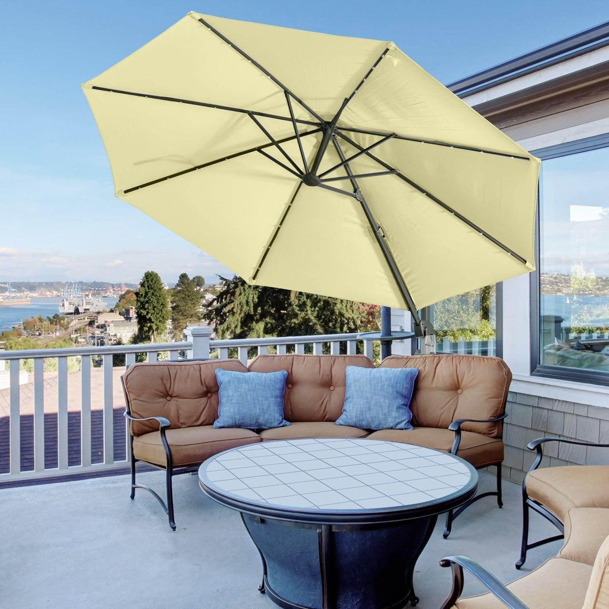 Beige offset garden umbrella with hexagonal canopy and black tilt frame