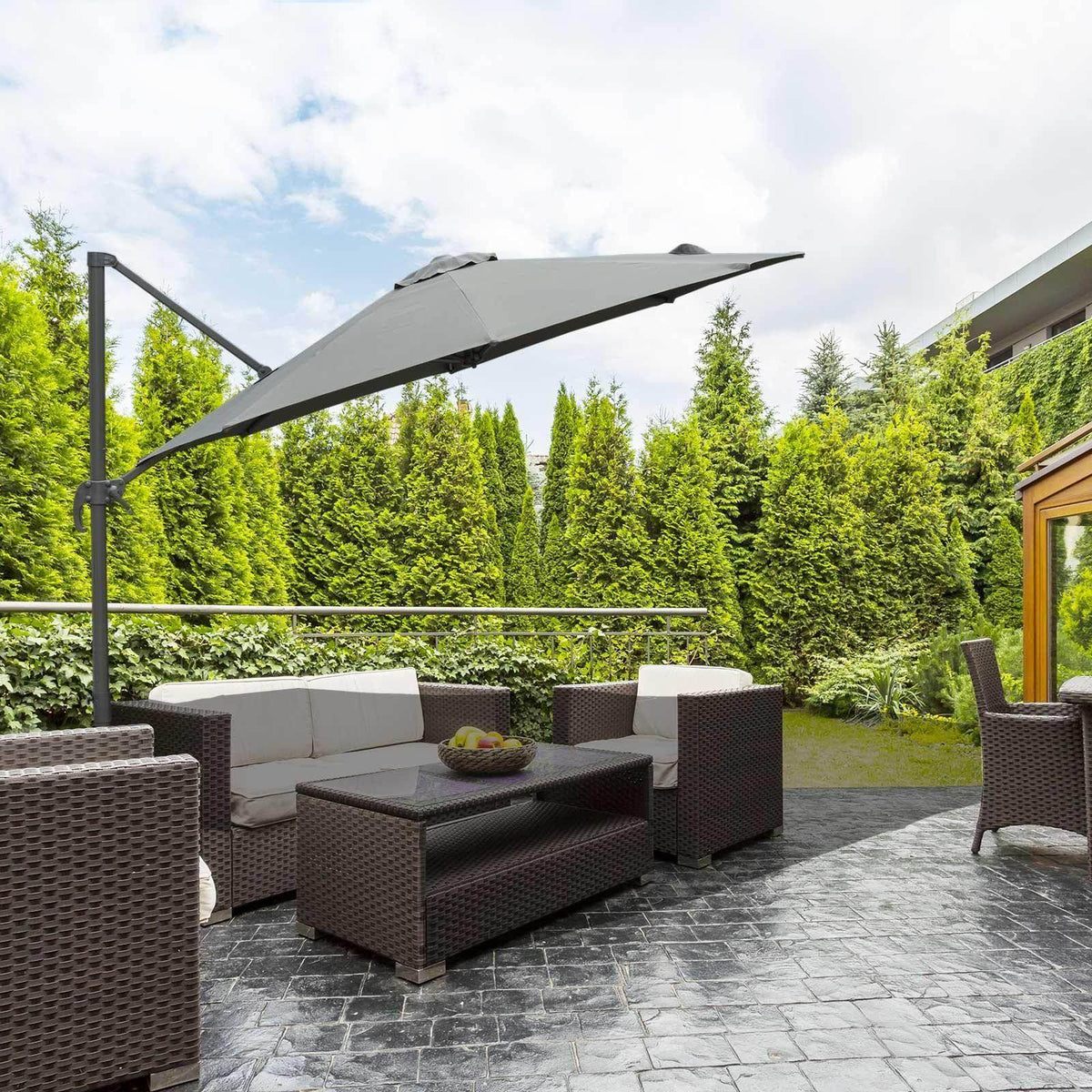 Dark grey patio umbrella with cross base, open canopy