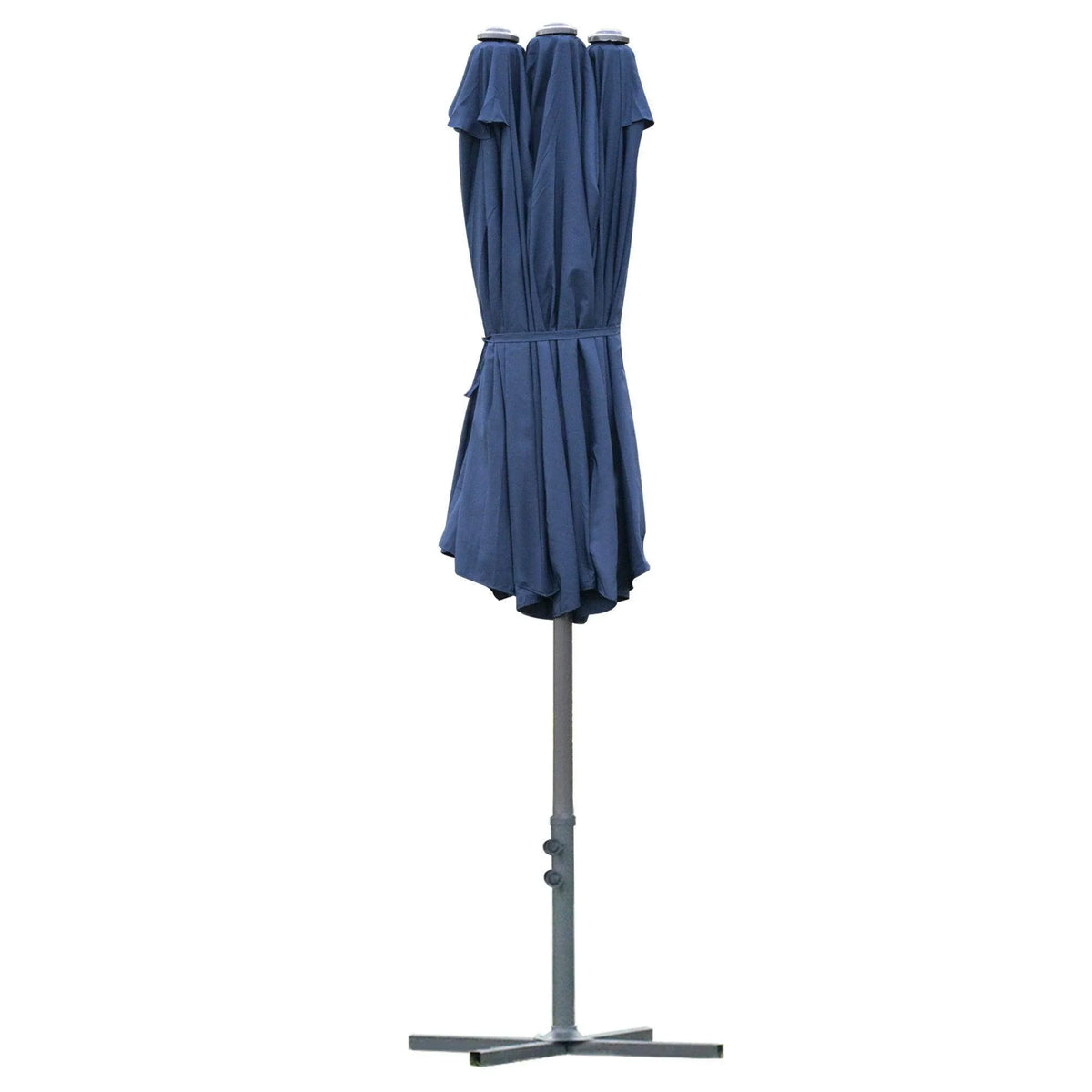 Blue outdoor sun umbrella in closed position with cover bundle atop center pole