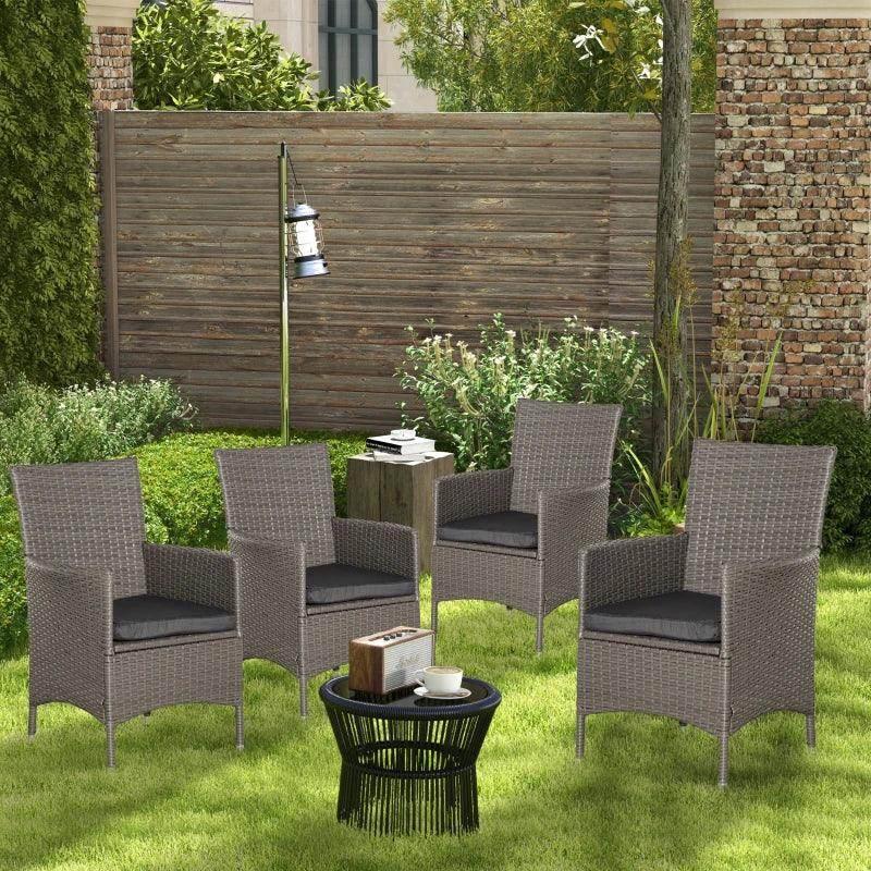 Gray-brown resin rattan patio chair set of four with dark seat cushions and armrests