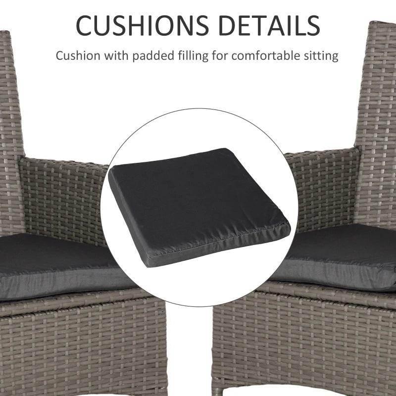 Gray-brown rattan chair with dark padded seat cushion