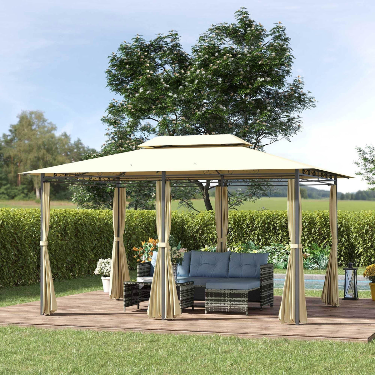Beige outdoor gazebo with curtains, wicker sofa, and side table on wooden deck in garden