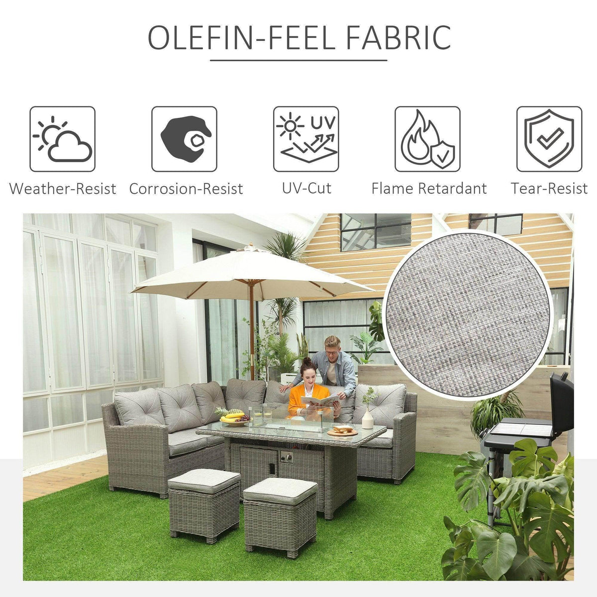 Outdoor rattan sofa set with light gray cushions and glass fire pit table in a backyard setting