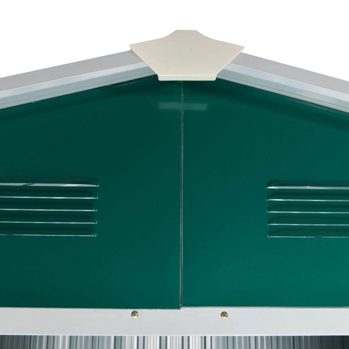 Close-up of green metal shed front with ventilation openings and sliding door seam
