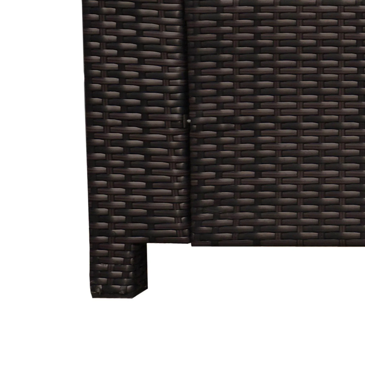 Close-up of dark brown woven rattan side panel and arm corner on sofa chair