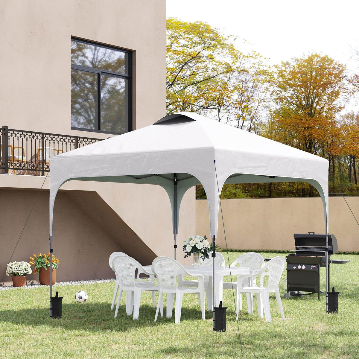 Compact pop-up gazebo with white canopy and gray frame, open side for seating