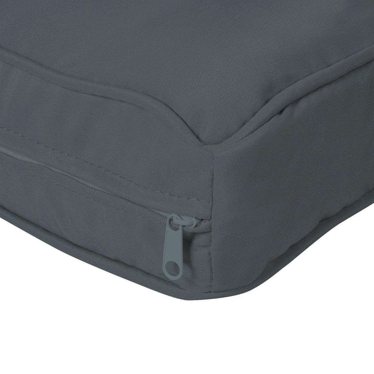 Dark green cushion cover corner with stitched seam and zipper closure