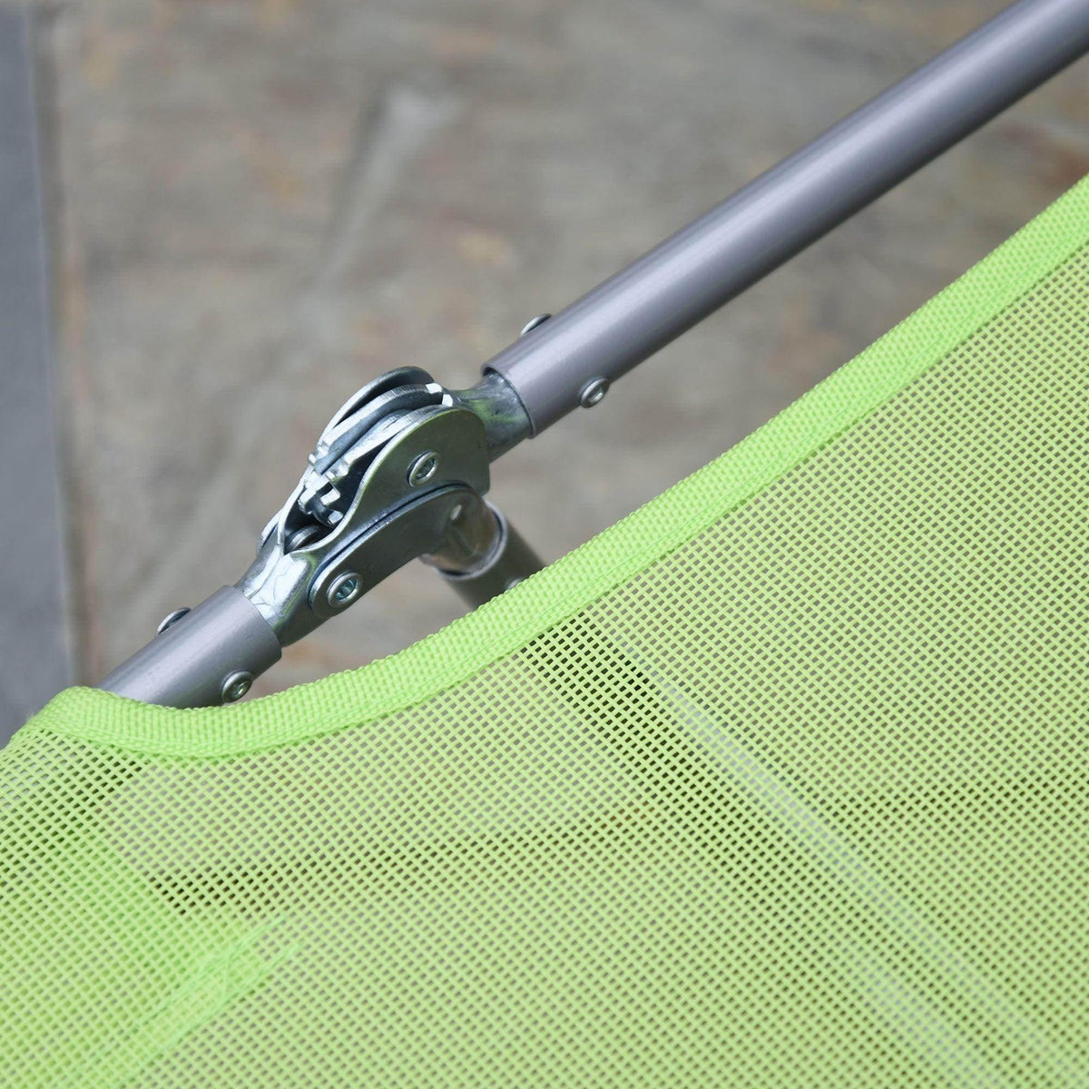 Lime green mesh outdoor chair with sturdy metal frame and adjustable joint detail