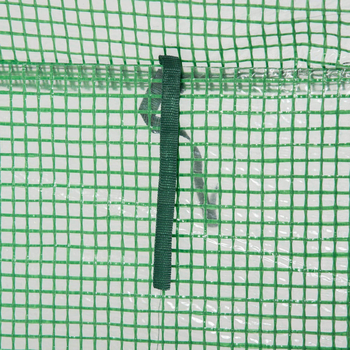Green PE greenhouse cover side strap and tie loop close-up